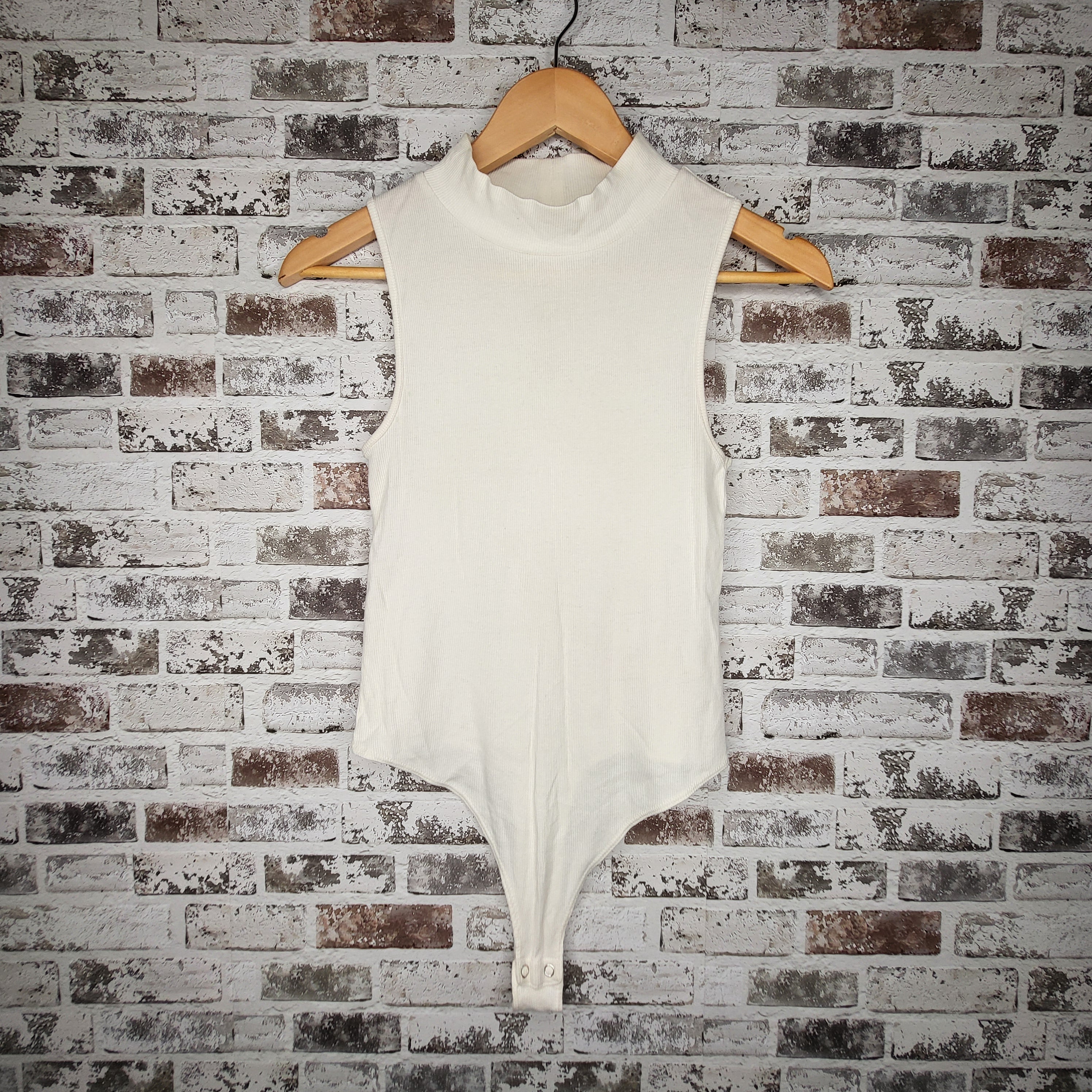 Banana Republic ivory ribbed mock neck bodysuit (Women's Size XS)