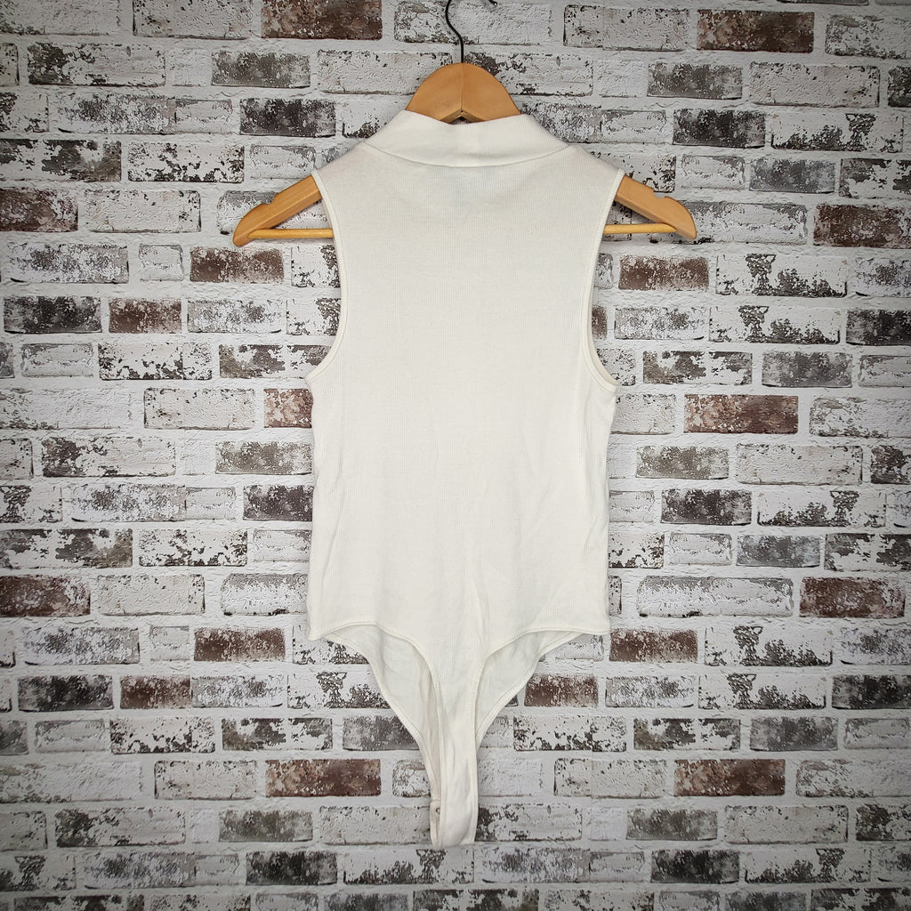 Banana Republic ivory ribbed mock neck bodysuit (Women's Size XS)