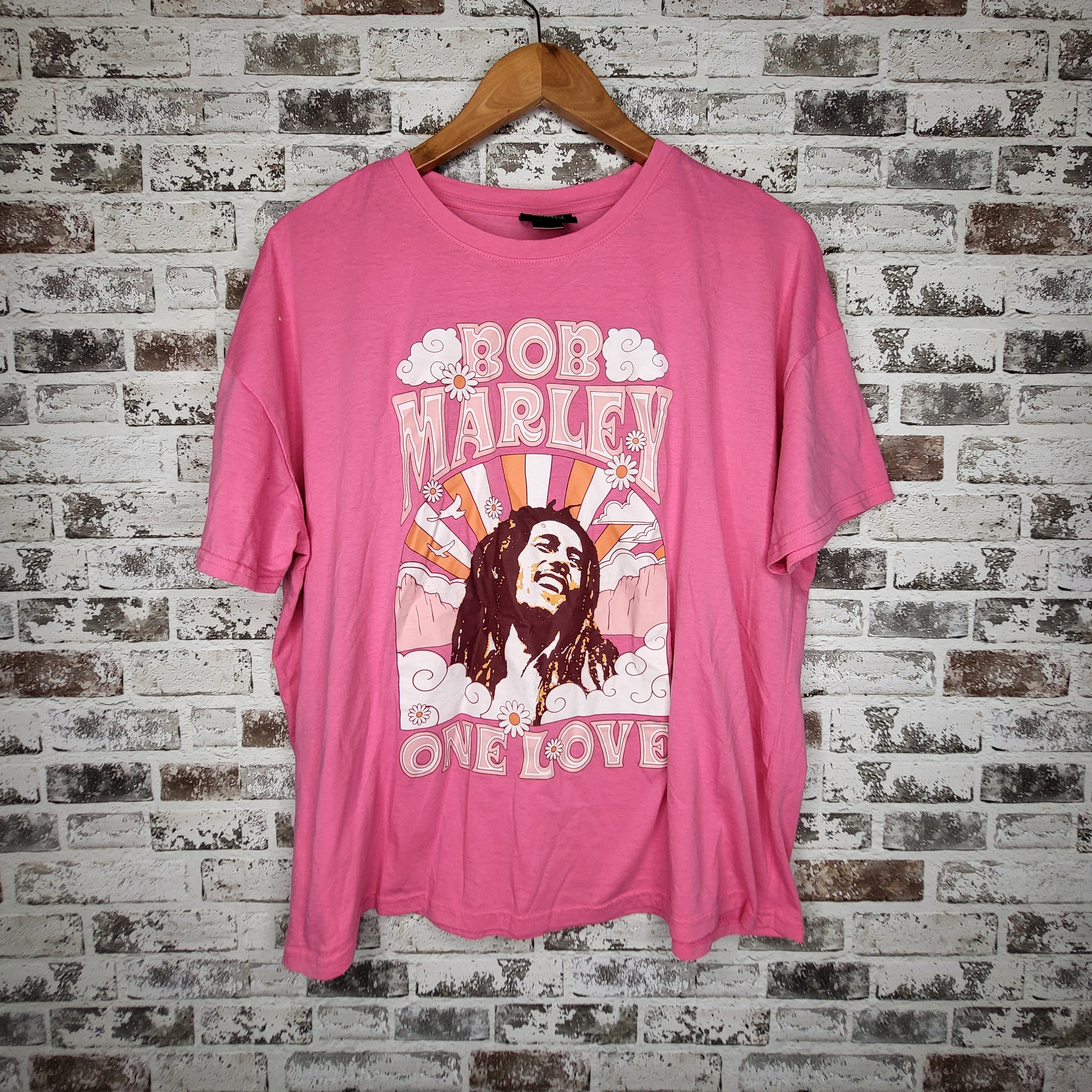 Zion Rootswear pink bob marley graphic t-shirt (Women's Size L)