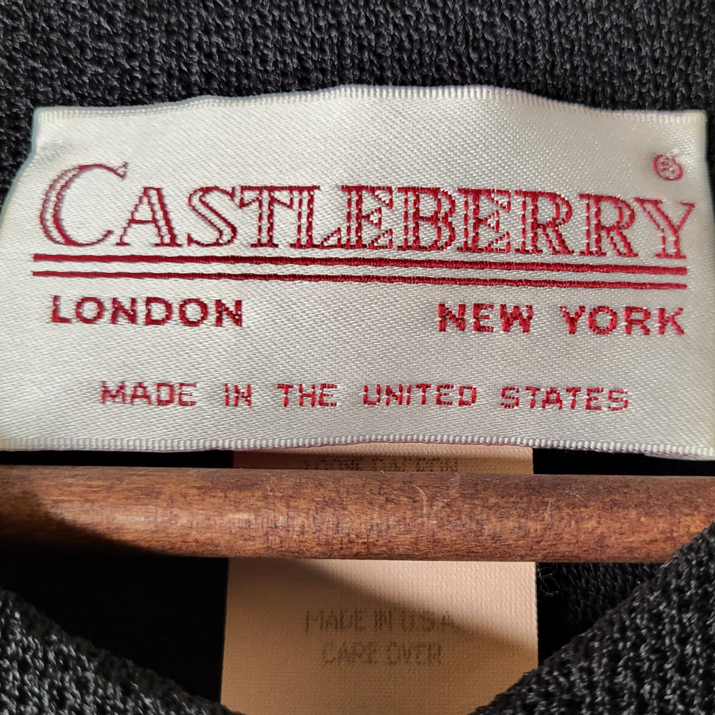 Castleberry black pearl-button knit jacket (Women's Size M)