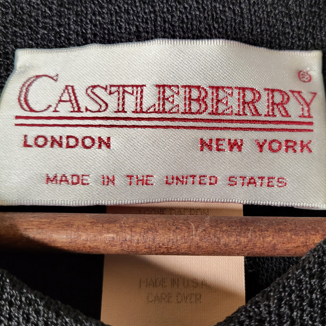 Castleberry black pearl-button knit jacket (Women's Size M)