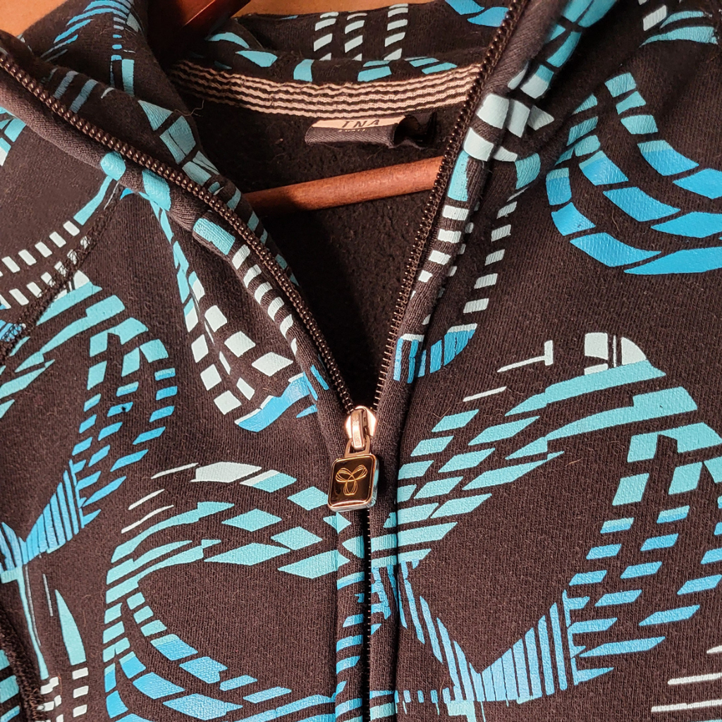 TNA black + turquoise all-over logo zip hoodie (Women's Size S)